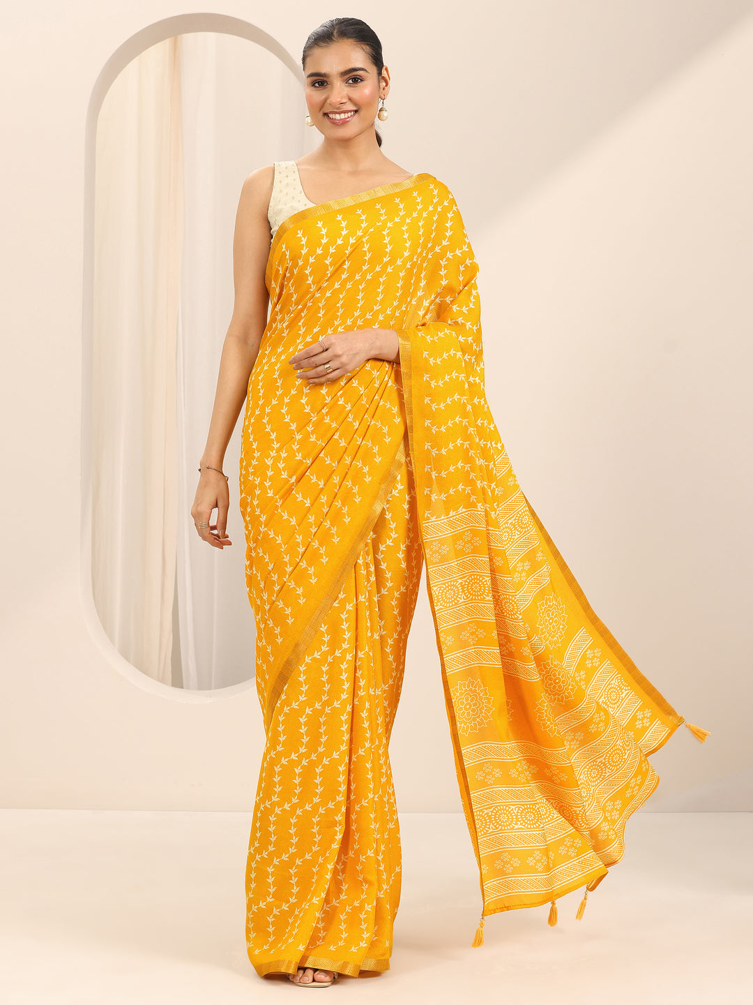 Mustard Printed Georgette Saree With Unstitched Blouse Piece