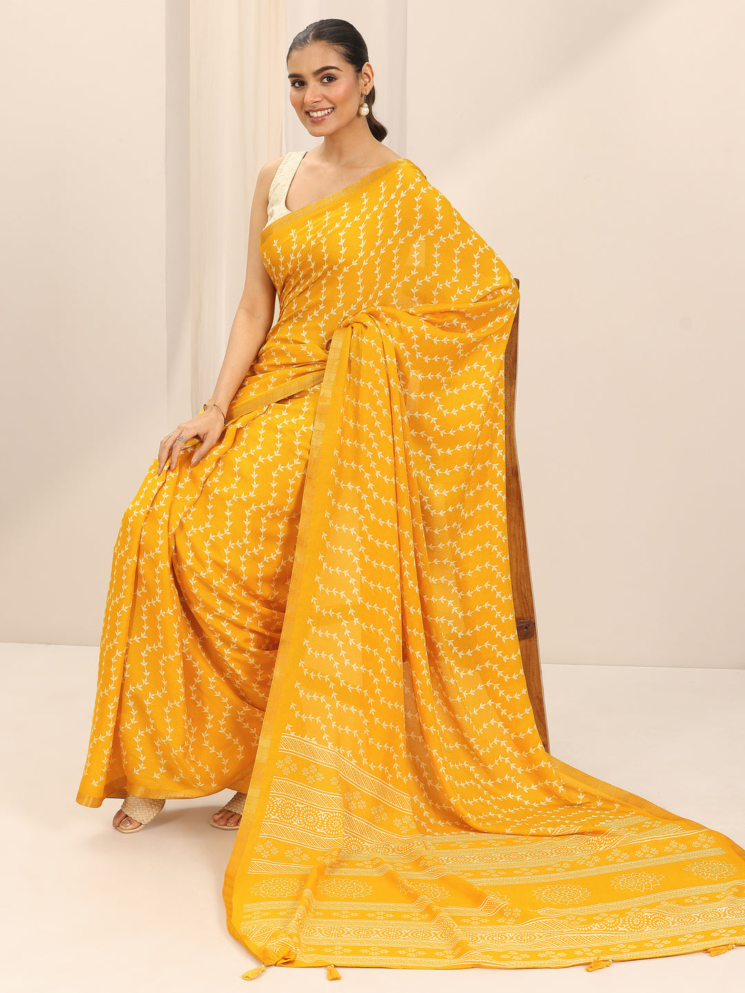 Mustard Printed Georgette Saree With Unstitched Blouse Piece