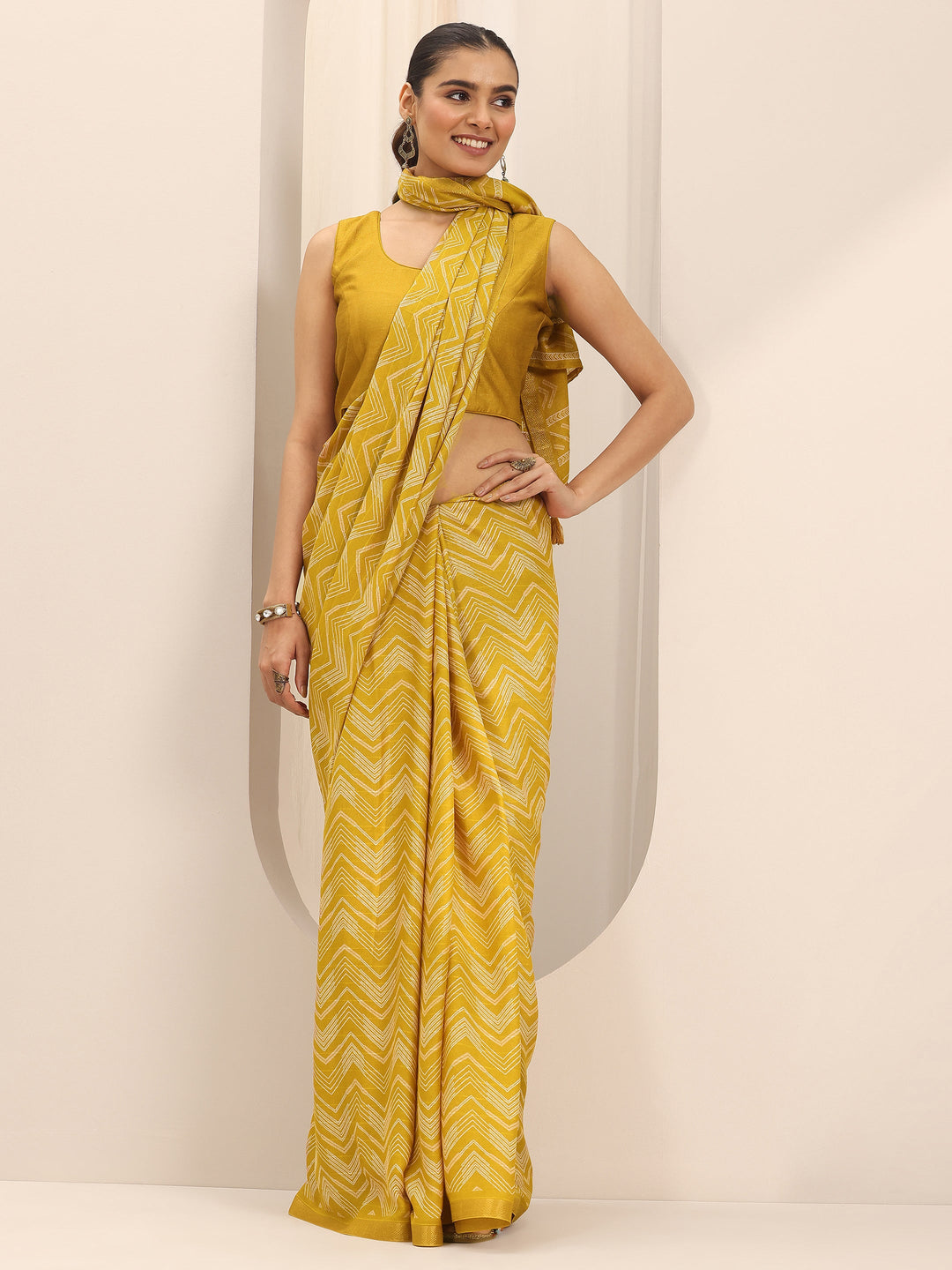 Mustard Printed Georgette Saree With Unstitched Blouse Piece