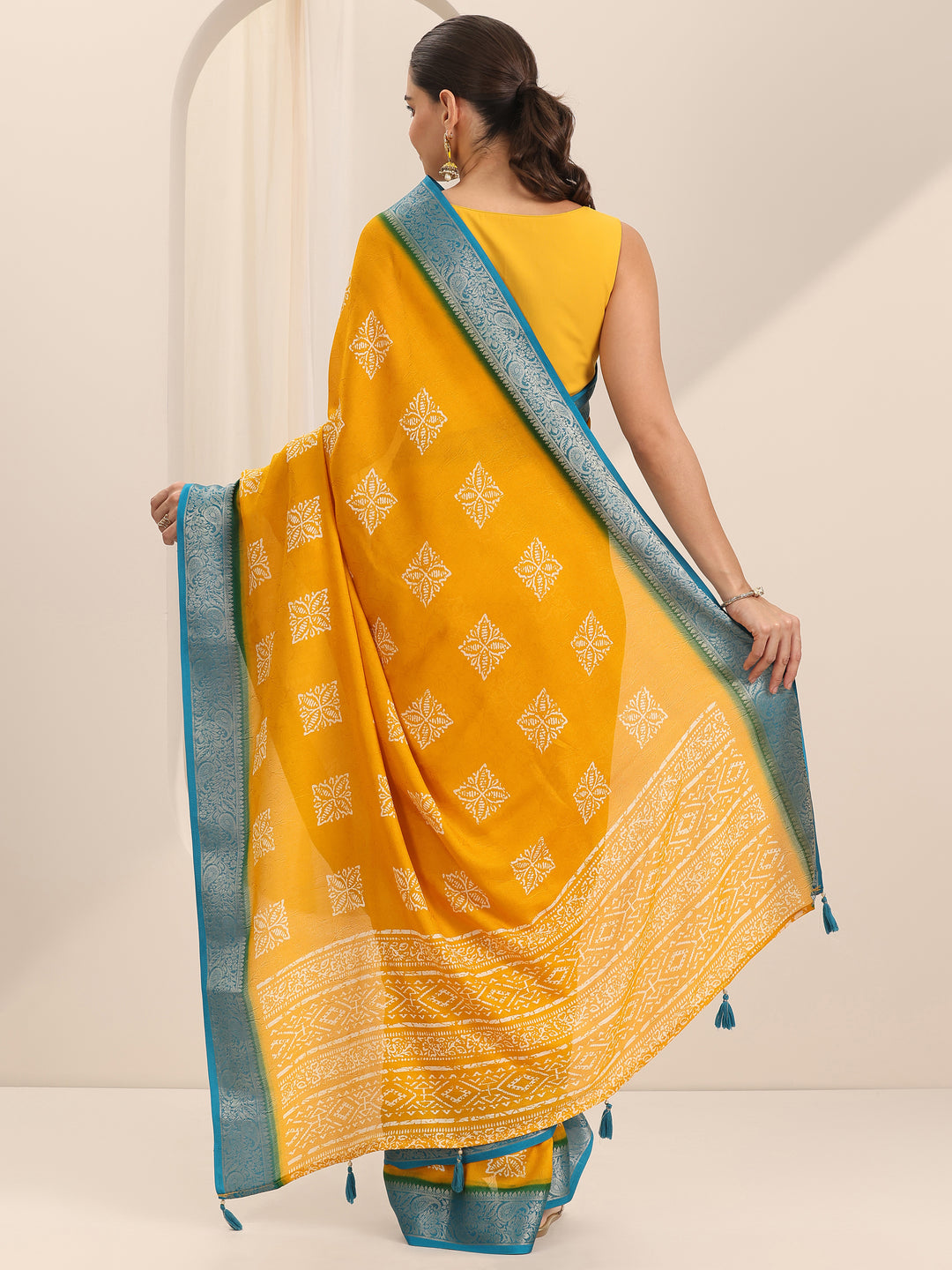 Mustard Printed Georgette Saree With Unstitched Blouse Piece