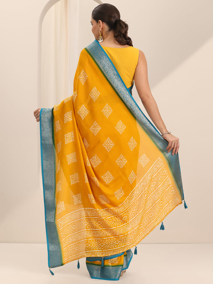 Mustard Printed Georgette Saree With Unstitched Blouse Piece