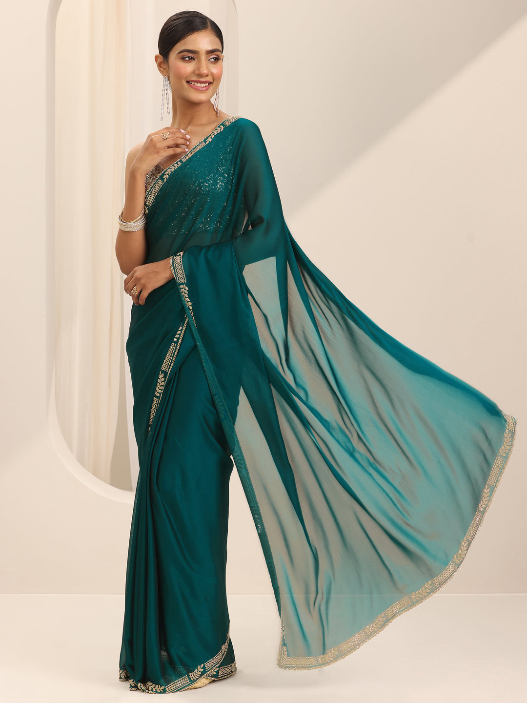 Teal Solid Jimmy Choo Satin Saree With Unstitched Blouse Piece