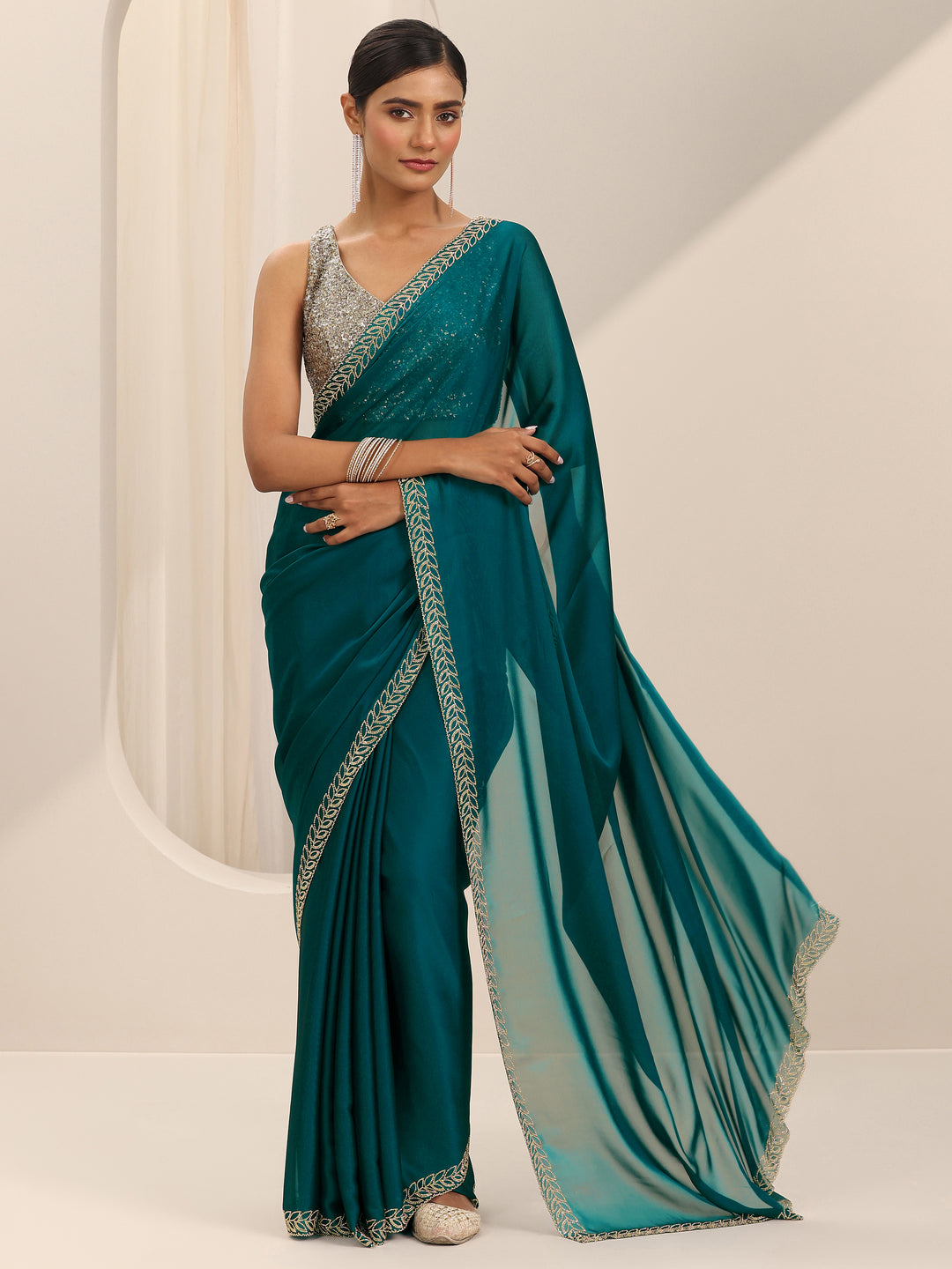 Teal Solid Jimmy Choo Satin Saree With Unstitched Blouse Piece