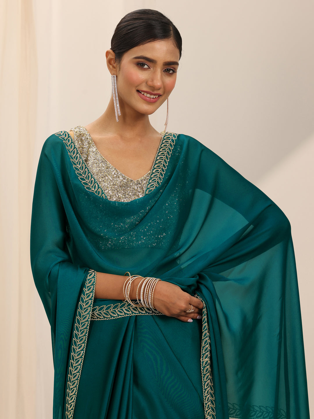Teal Solid Jimmy Choo Satin Saree With Unstitched Blouse Piece