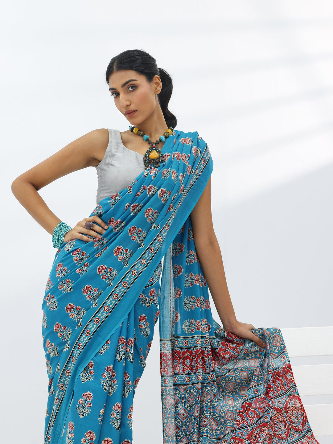 Turquoise Blue Printed Cotton Saree With Unstitched Blouse Piece