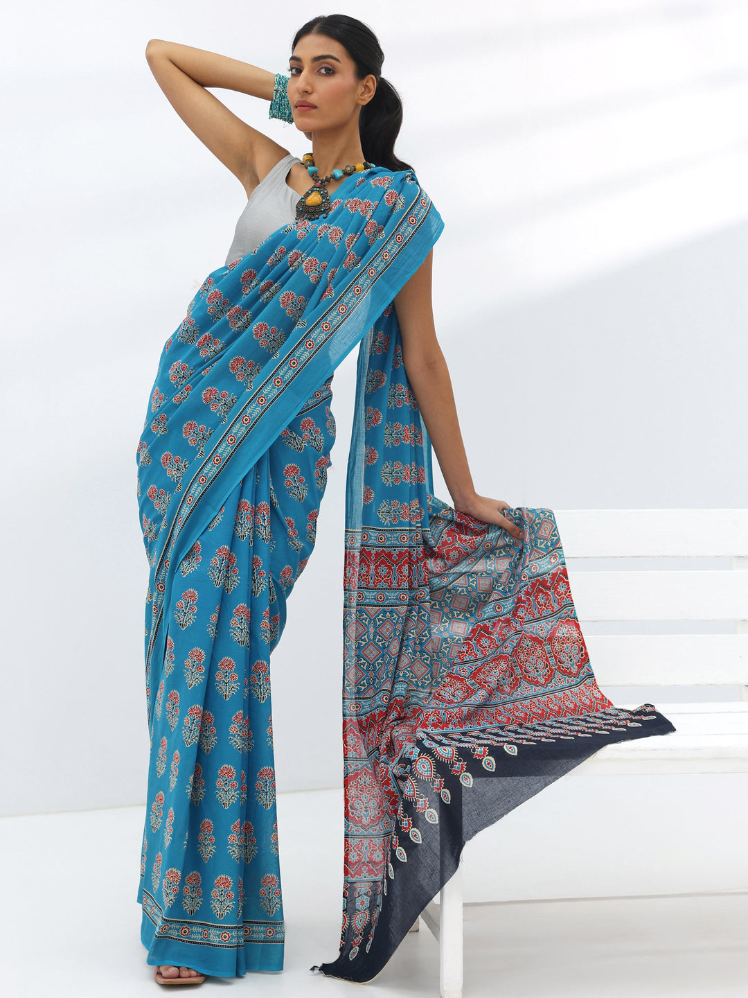 Turquoise Blue Printed Cotton Saree With Unstitched Blouse Piece