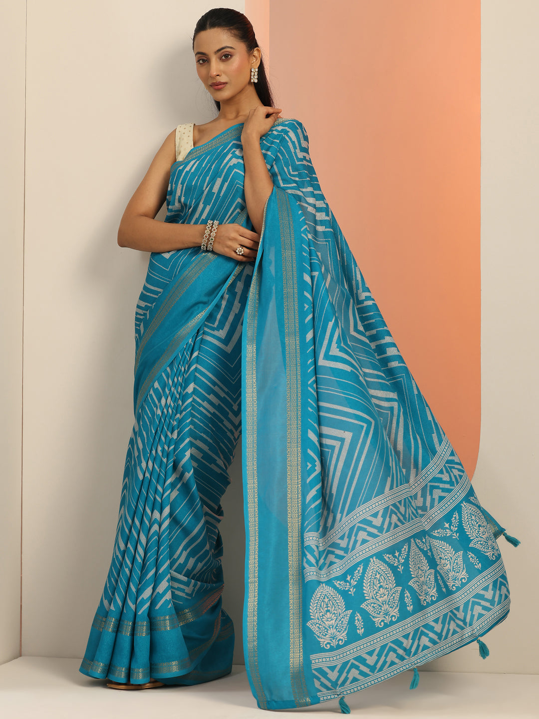 Teal Printed Georgette Saree With Unstitched Blouse Piece