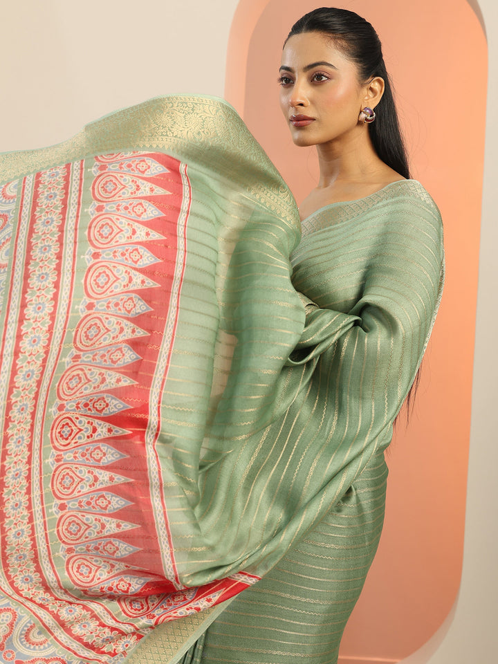 Green Woven Design Georgette Saree With Unstitched Blouse Piece