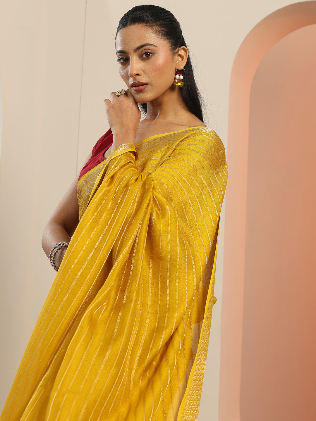 Mustard Woven Design Georgette Saree With Unstitched Blouse Piece