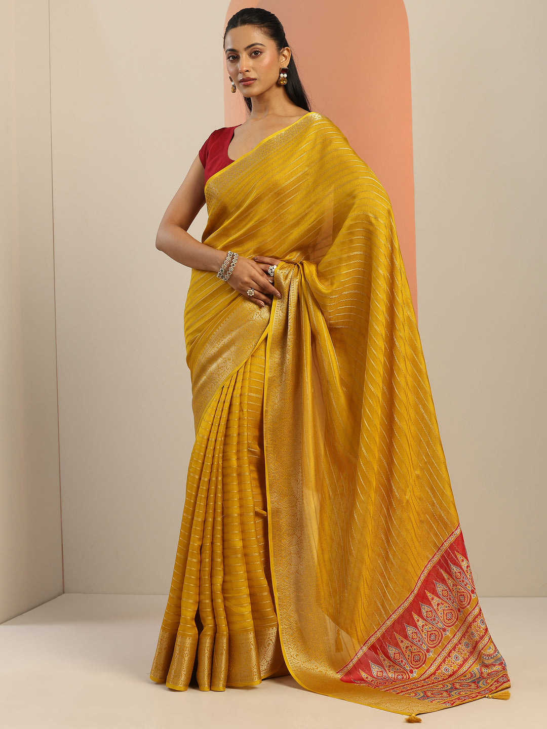 Mustard Woven Design Georgette Saree With Unstitched Blouse Piece