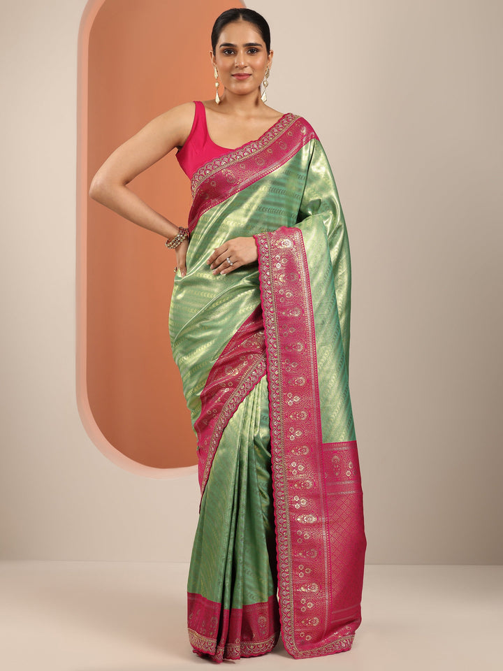 Green Woven Design Silk Blend Saree With Unstitched Blouse Piece