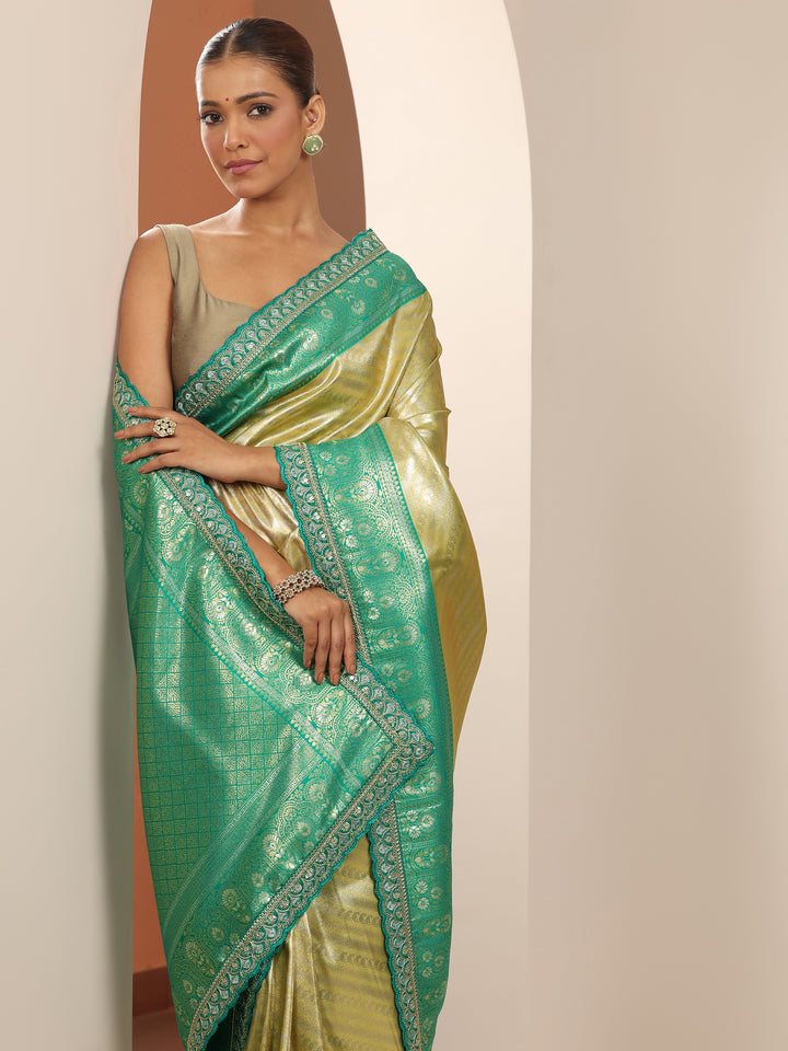 Yellow Woven Design Banarasi Silk Blend Saree With Unstitched Blouse Piece