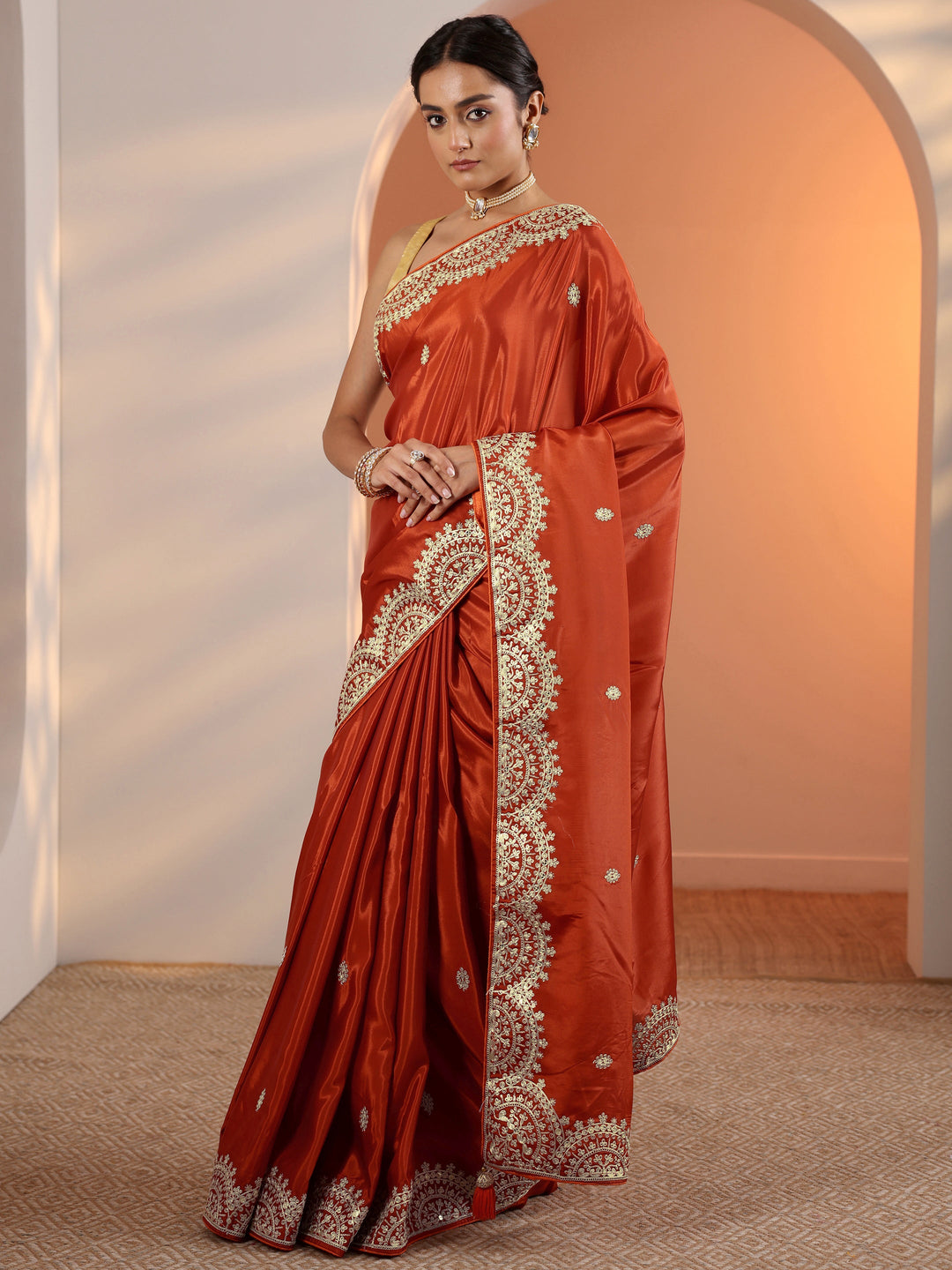 Rust Embellished Crepe Saree With Unstitched Blouse Piece