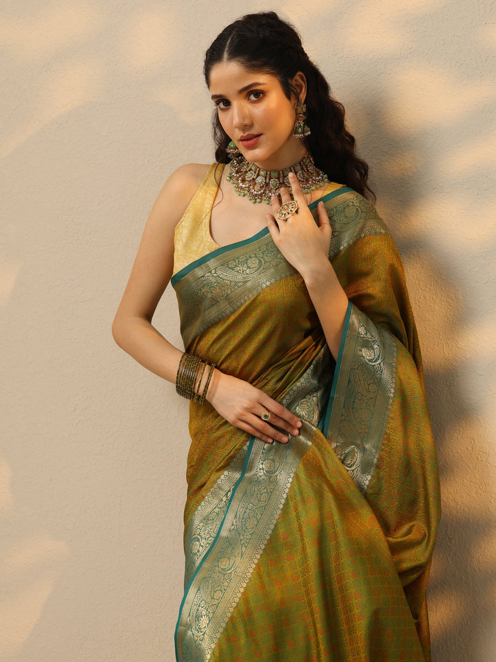 Green Woven Design Banarasi Silk Blend Saree With Unstitched Blouse Piece