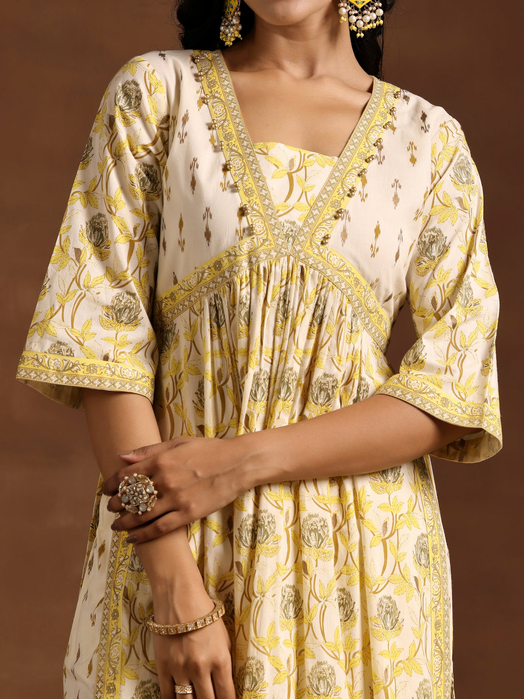 Yellow Printed Cotton A-Line Kurta With Salwar