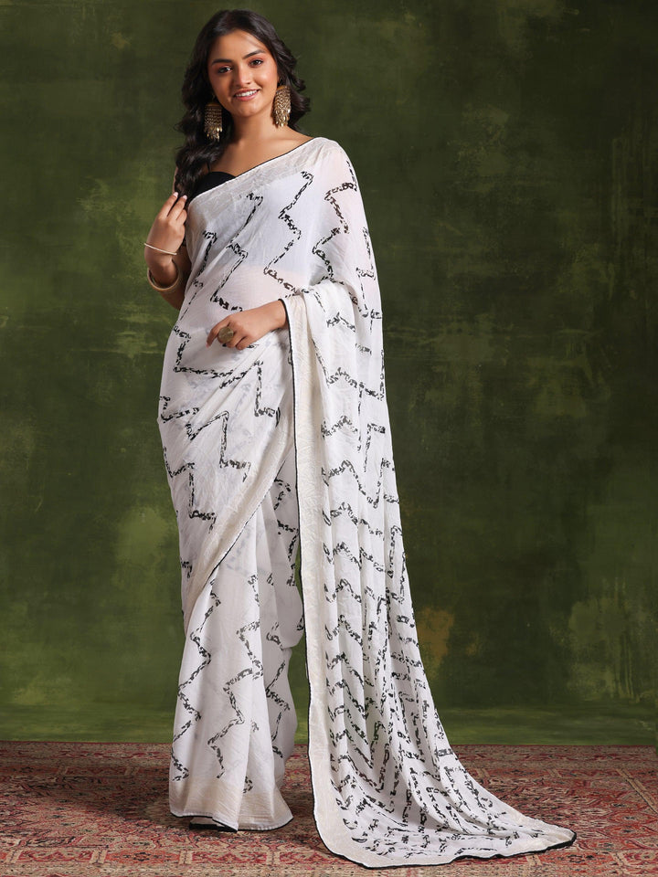 Off White Printed Poly Georgette Saree With Unstitched Blouse Piece
