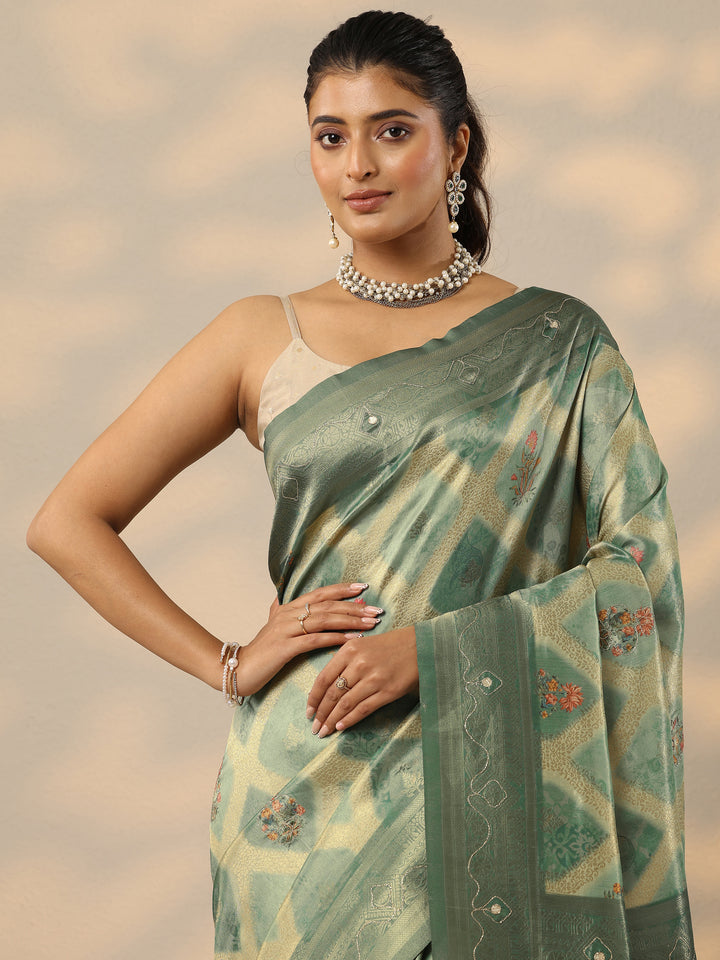 Green Woven Design Silk Blend Saree With Unstitched Blouse Piece