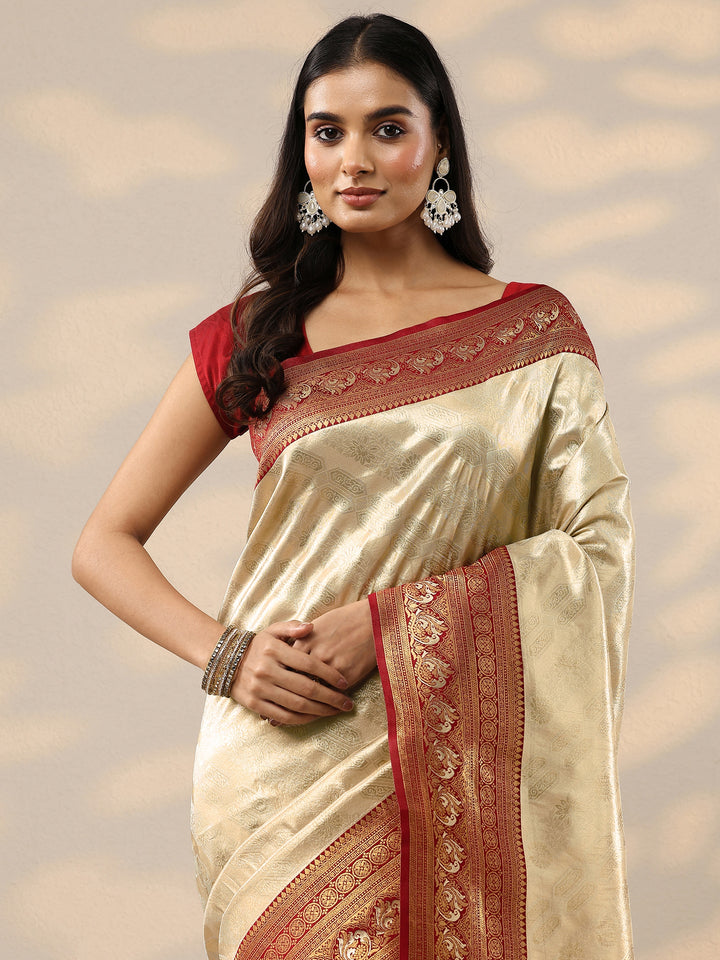 Gold Woven Design Silk Blend Saree With Unstitched Blouse Piece