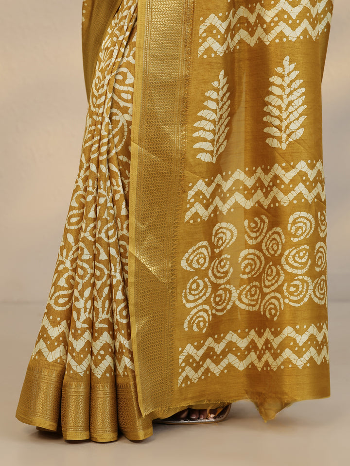 Mustard Batik Printed Silk Blend Saree With Unstitched Blouse Piece
