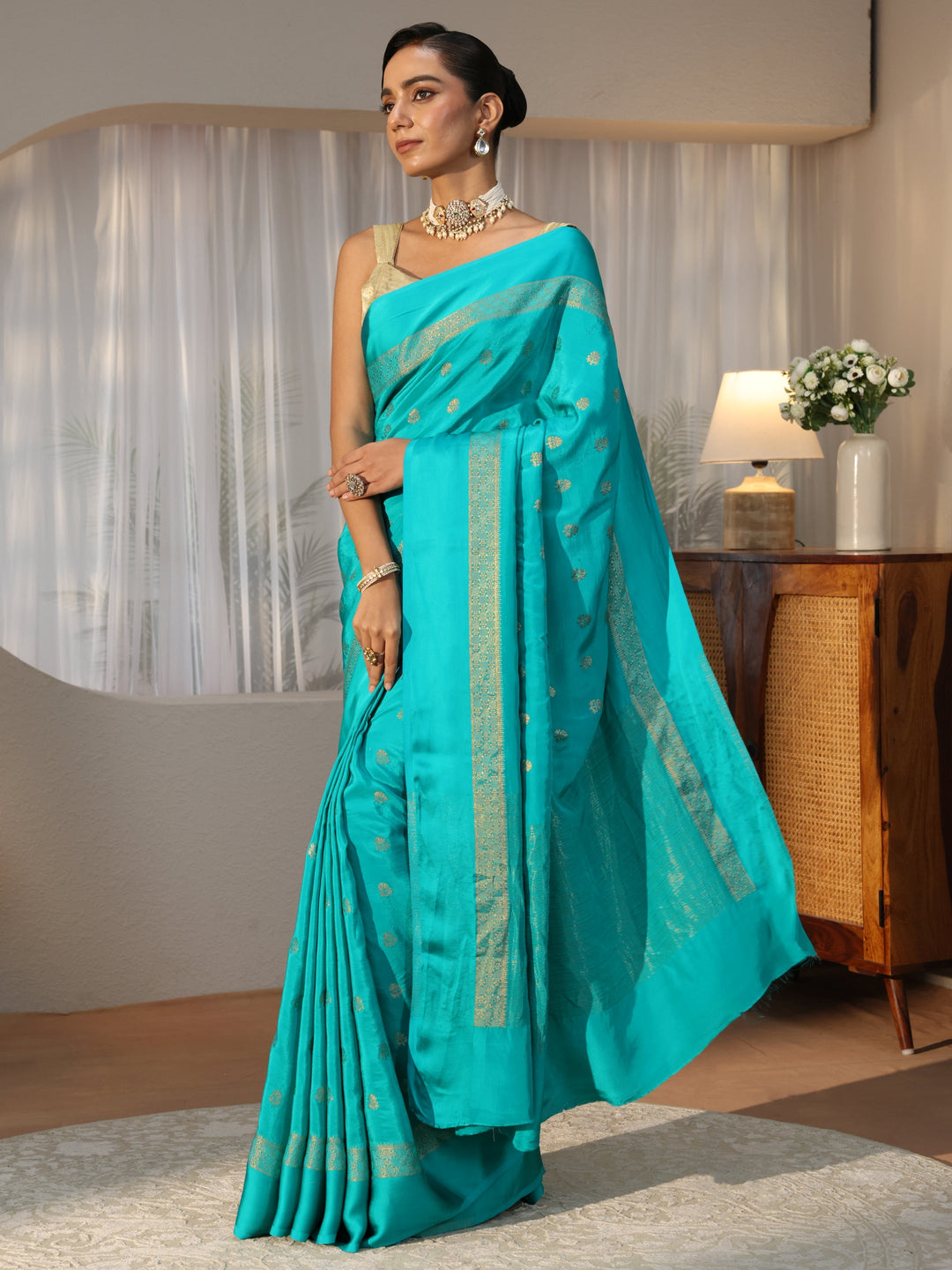 Aqua Blue Woven Design Silk Blend Saree