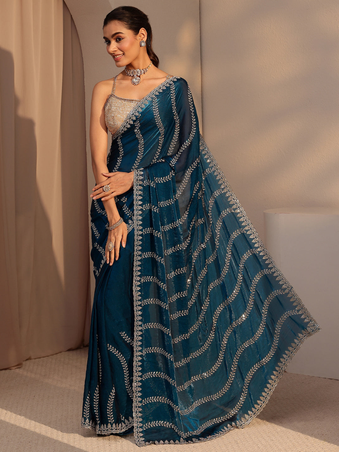 Peacock Blue Floral Embellished Tissue Saree