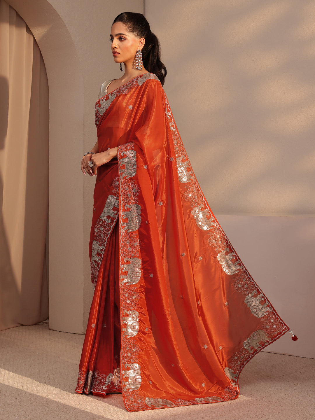 Libas Orange Embellished Satin Saree with Gaja Motif Border