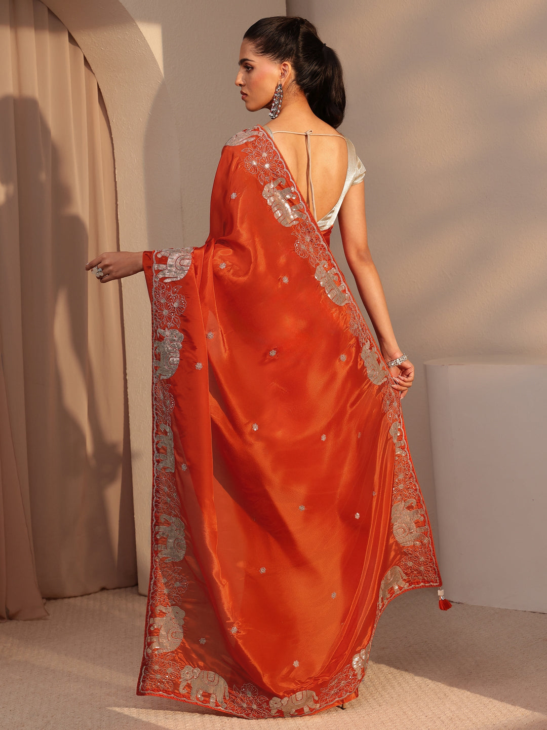 Libas Orange Embellished Satin Saree with Gaja Motif Border