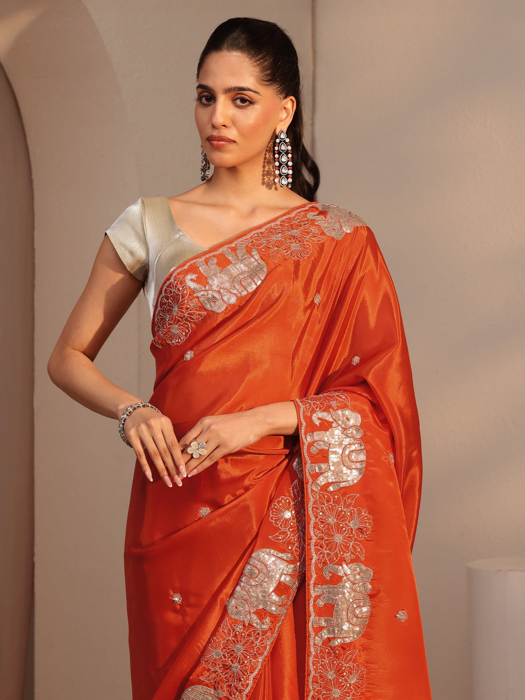 Libas Orange Embellished Satin Saree with Gaja Motif Border