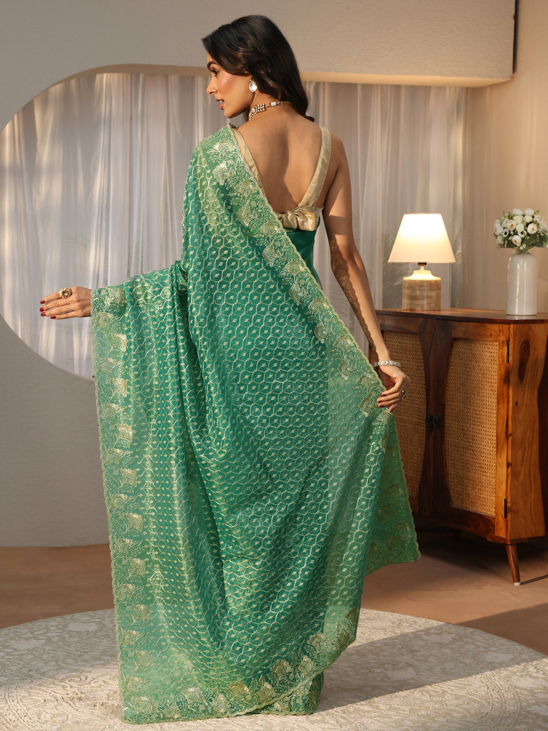 Sea Green Ethnic Embroidered Net Saree