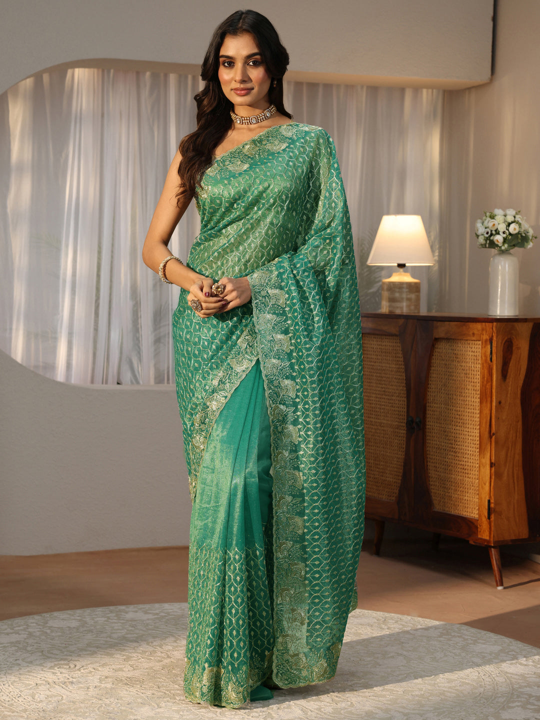 Sea Green Ethnic Embroidered Net Saree