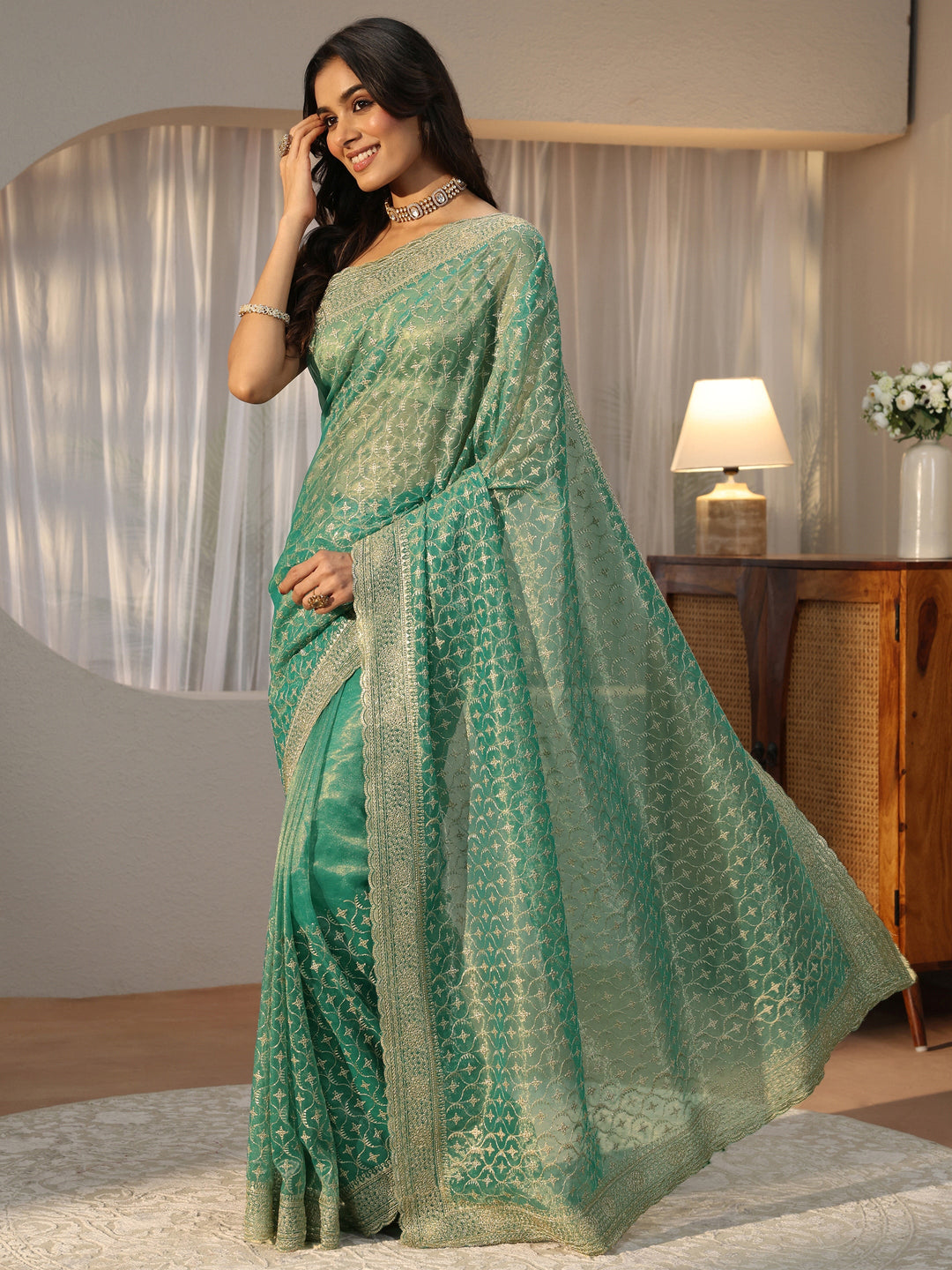 Sea Green Ethnic Embroidered Net Saree