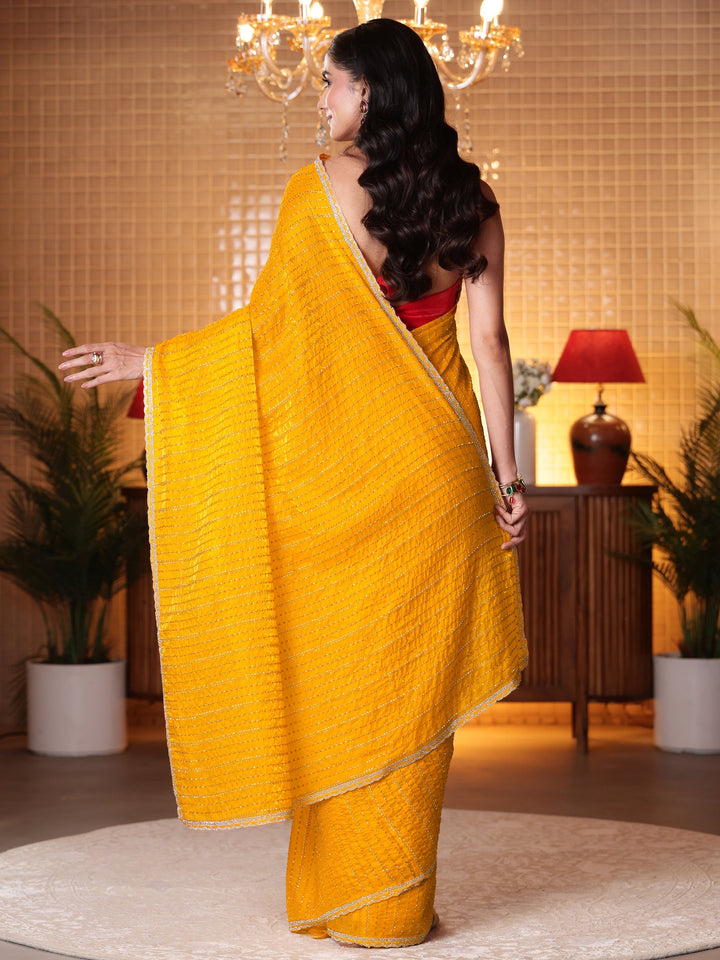 Libas Mustard Striped Embellished Tissue Saree