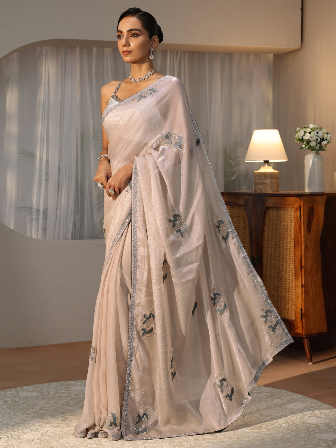 Cream Embellished Animal Motif Silk Blend Saree