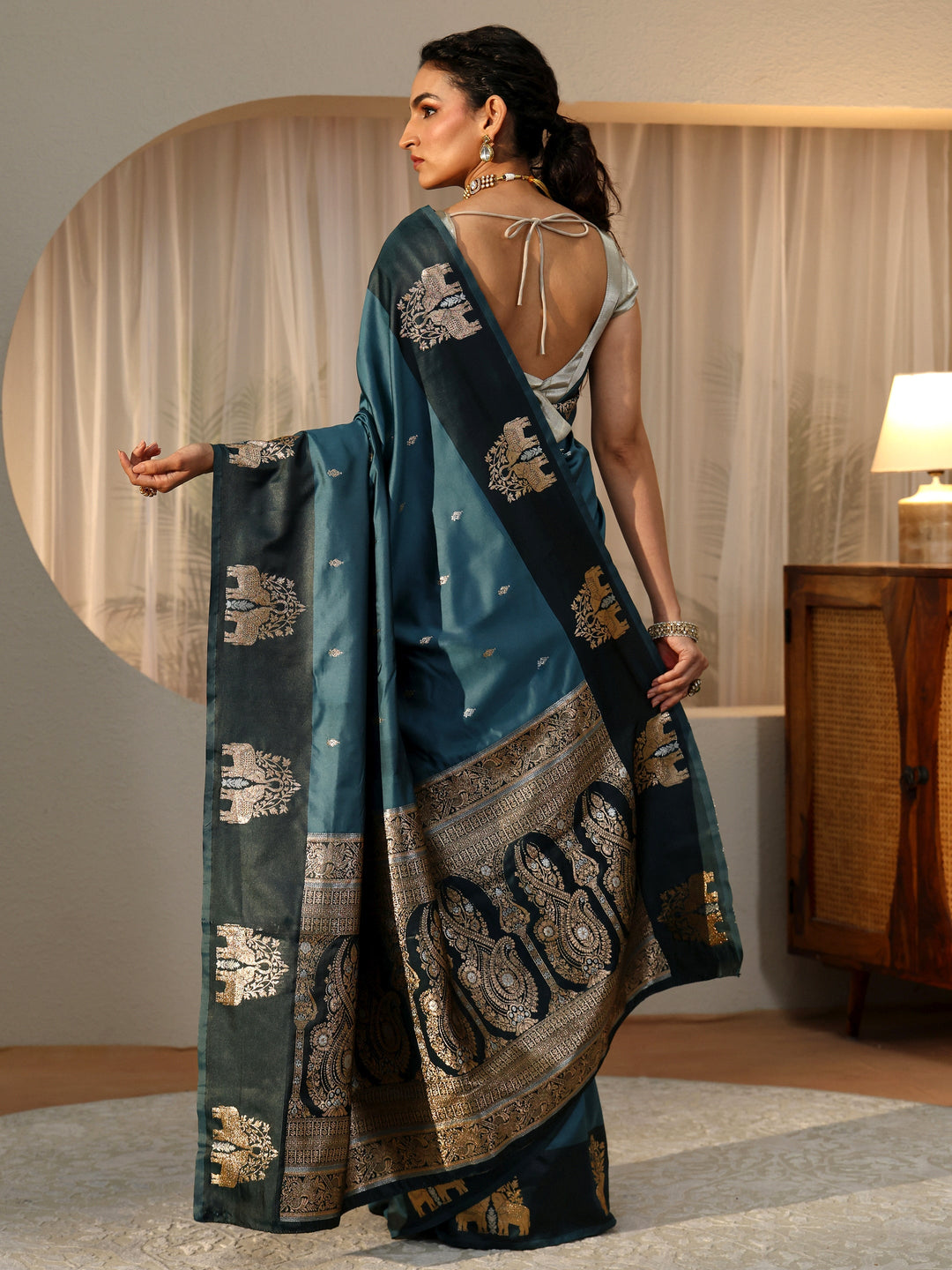 Libas Teal Blue Elephant Woven Design Silk Blend Saree