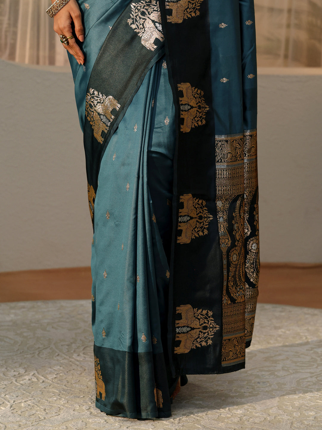 Libas Teal Blue Elephant Woven Design Silk Blend Saree