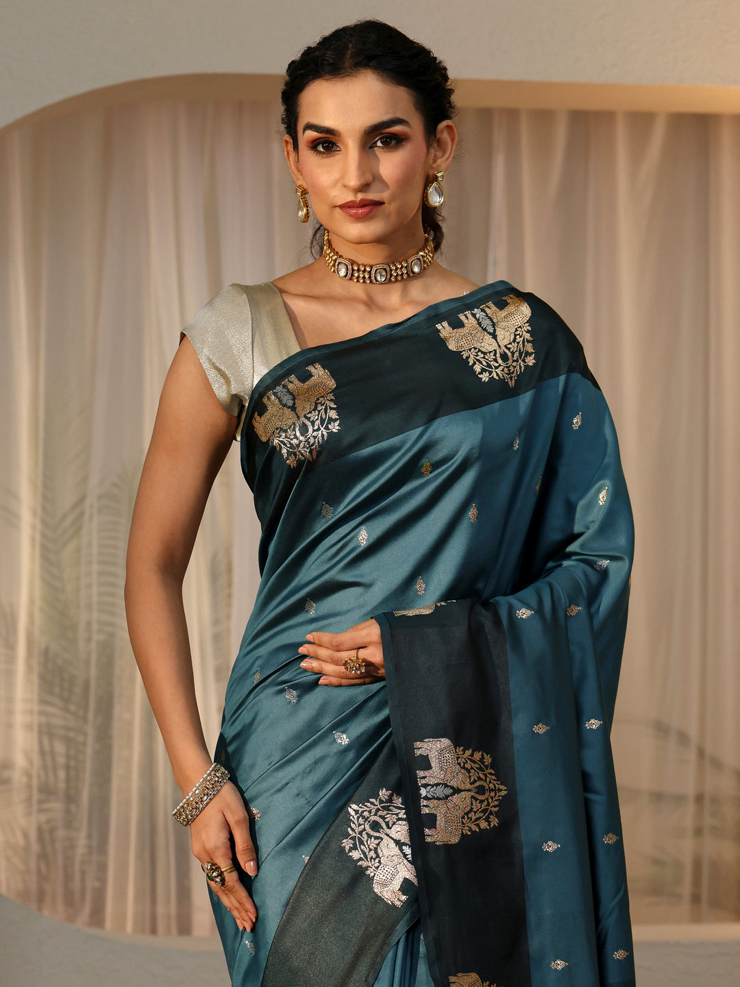 Libas Teal Blue Elephant Woven Design Silk Blend Saree