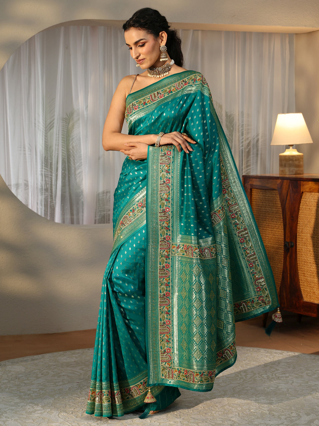Libas Art Teal Green Silk Blend Saree with Woven Border