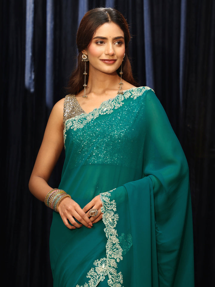 Libas Teal Green Georgette Saree with Embroidered Border