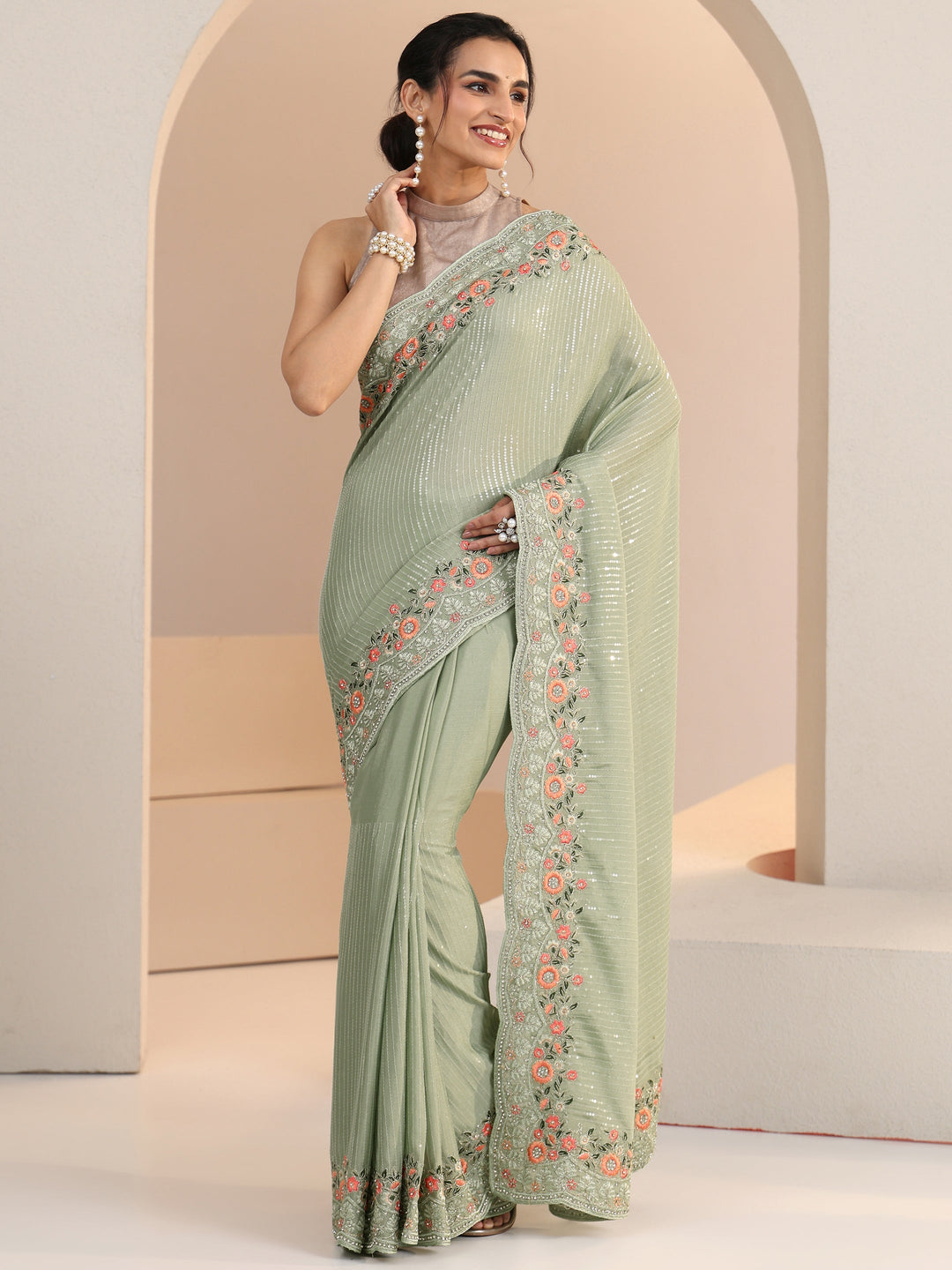 Libas Pista Green Striped Embellished Chiffon Saree with Floral Border