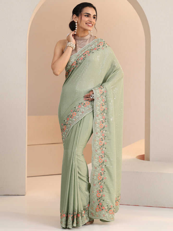 Libas Pista Green Striped Embellished Chiffon Saree with Floral Border