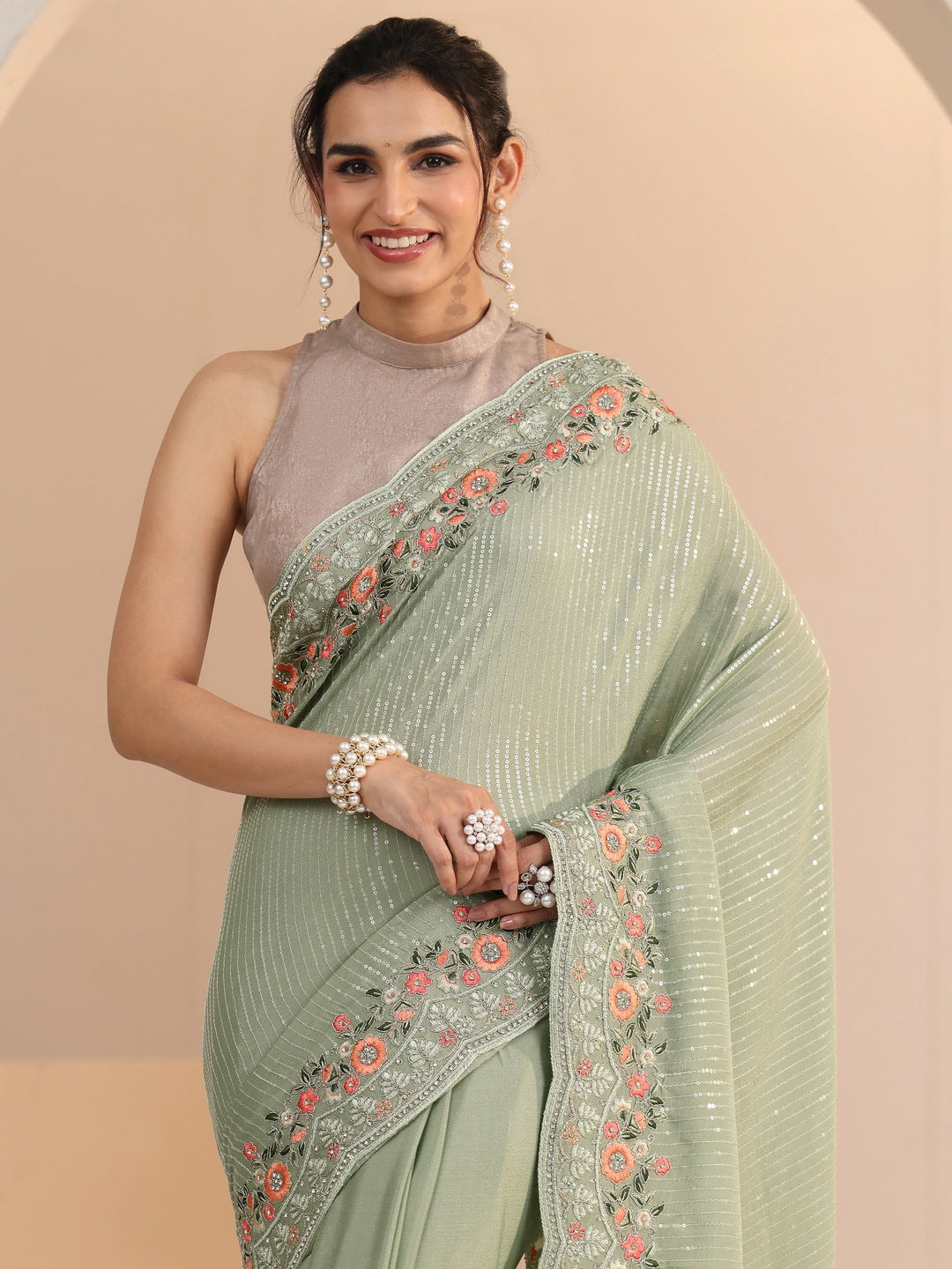 Libas Pista Green Striped Embellished Chiffon Saree with Floral Border