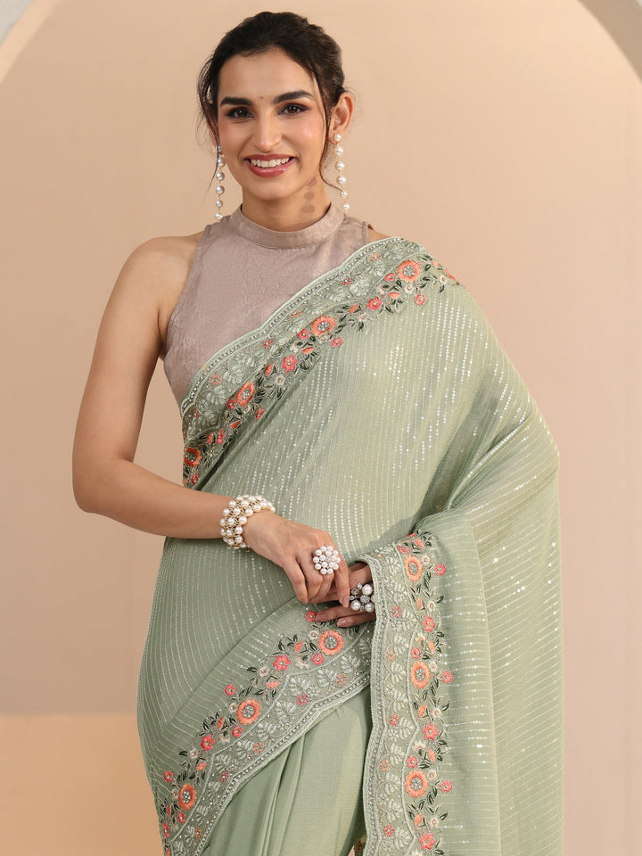 Libas Pista Green Striped Embellished Chiffon Saree with Floral Border