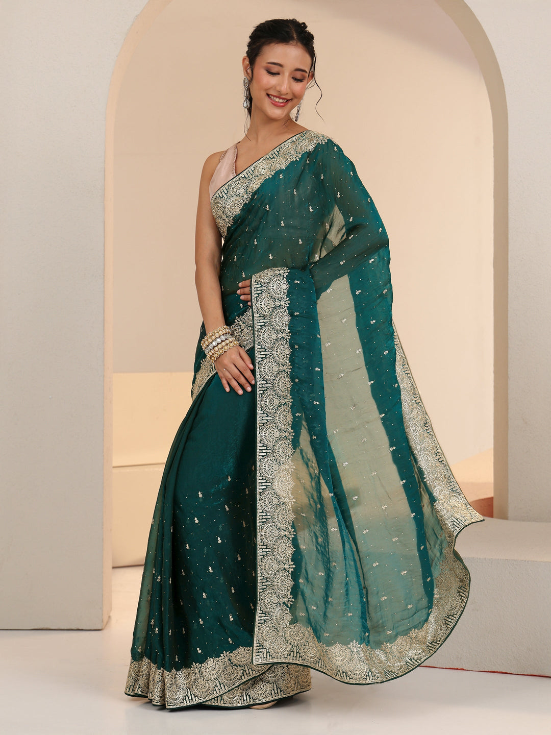 Libas Teal Green Embellished Tissue Saree