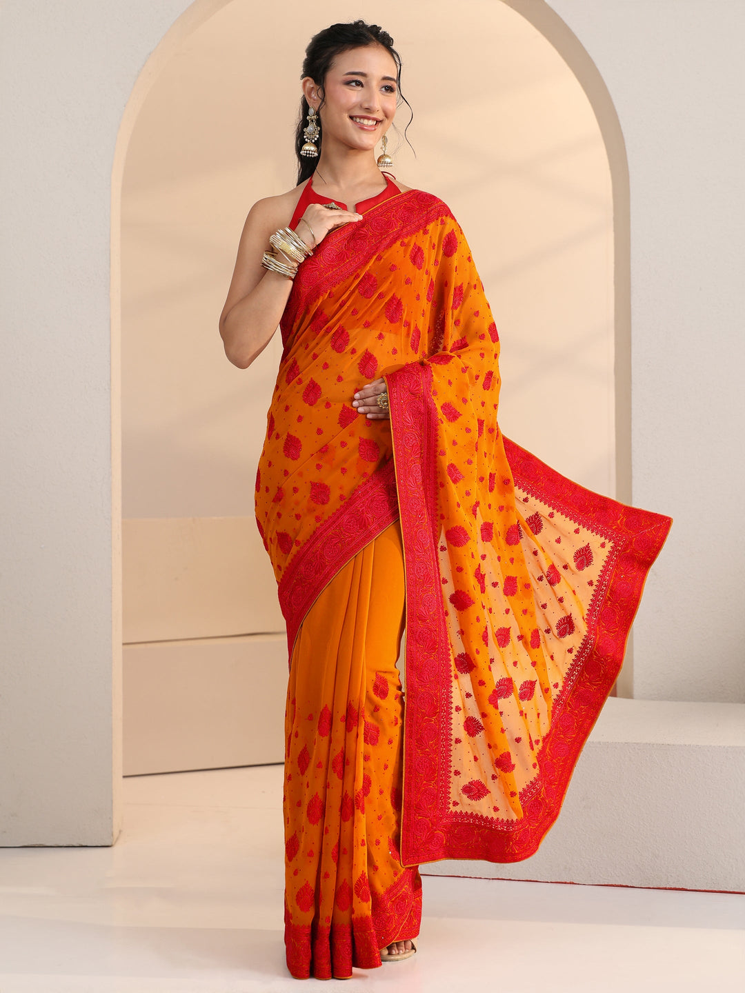 Libas Pulp Orange Georgette Saree with Embroidered Border