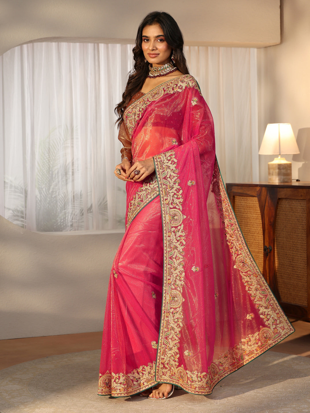 Libas Peach Net Saree with Embroidered Border