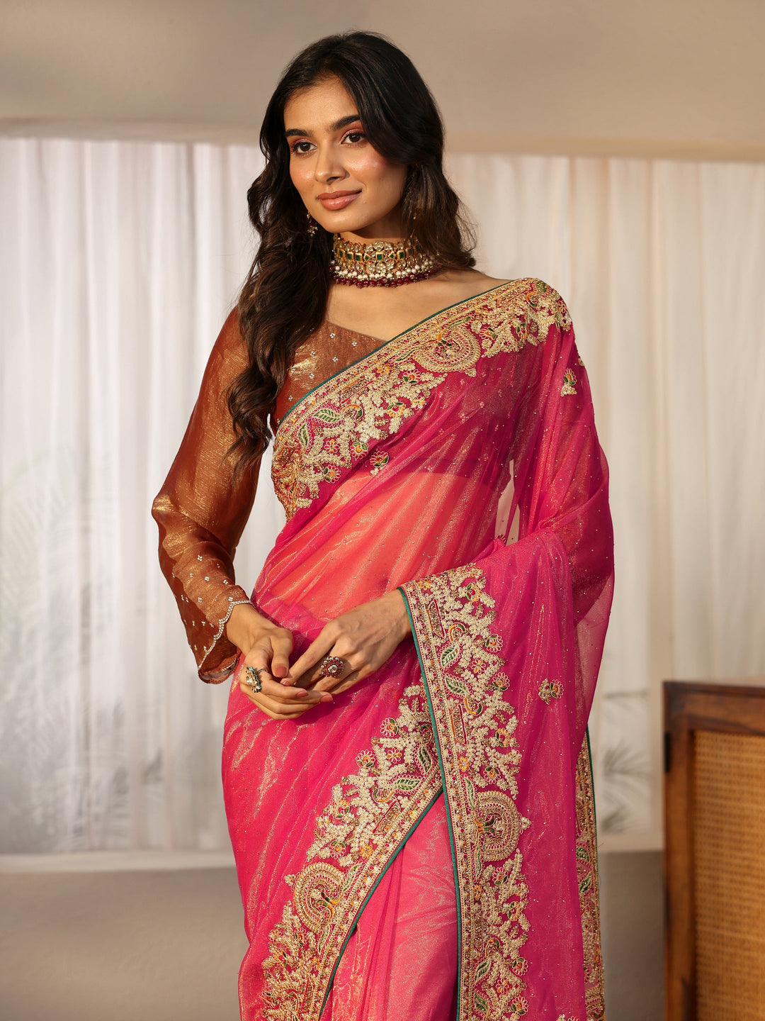 Libas Peach Net Saree with Embroidered Border