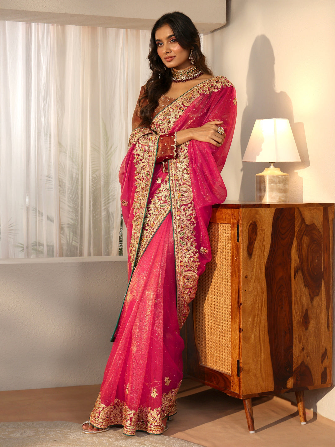 Libas Peach Net Saree with Embroidered Border