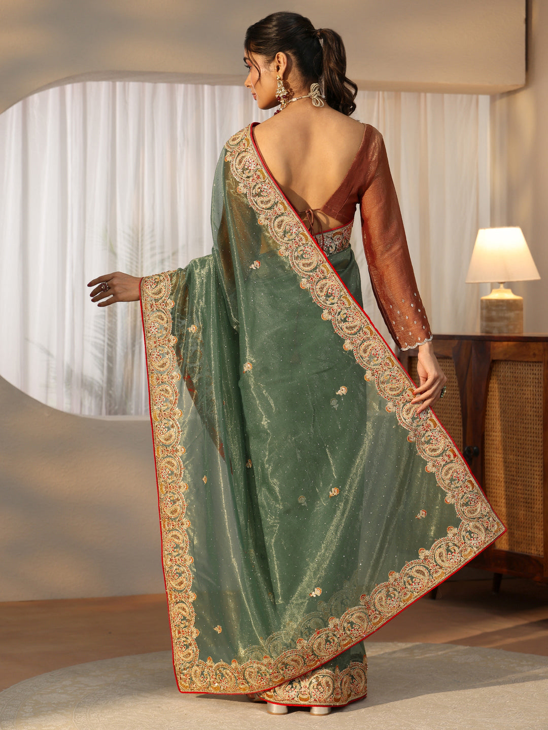 Libas Olive Green Net Saree with Embellished Paisley Border