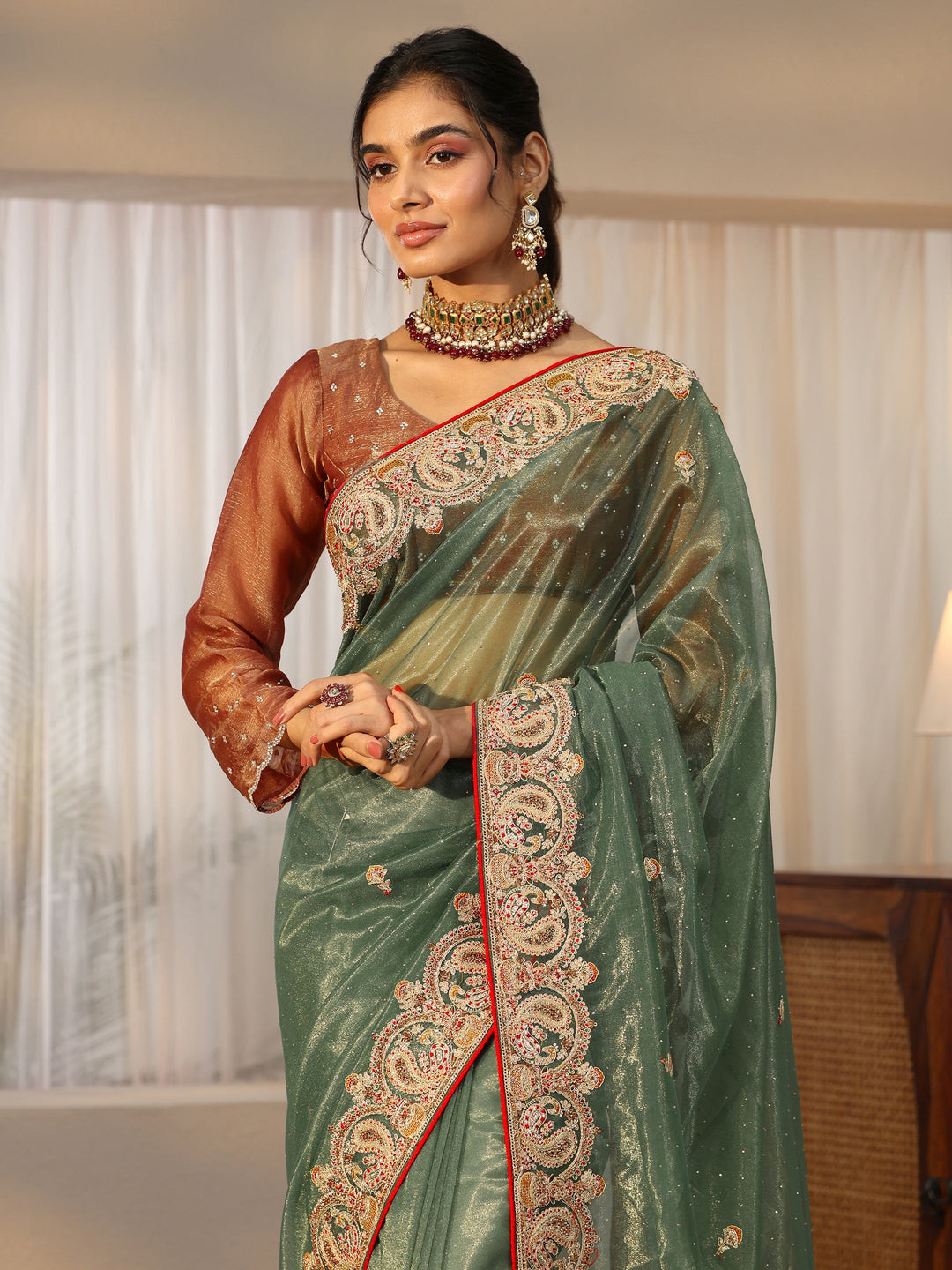 Libas Olive Green Net Saree with Embellished Paisley Border