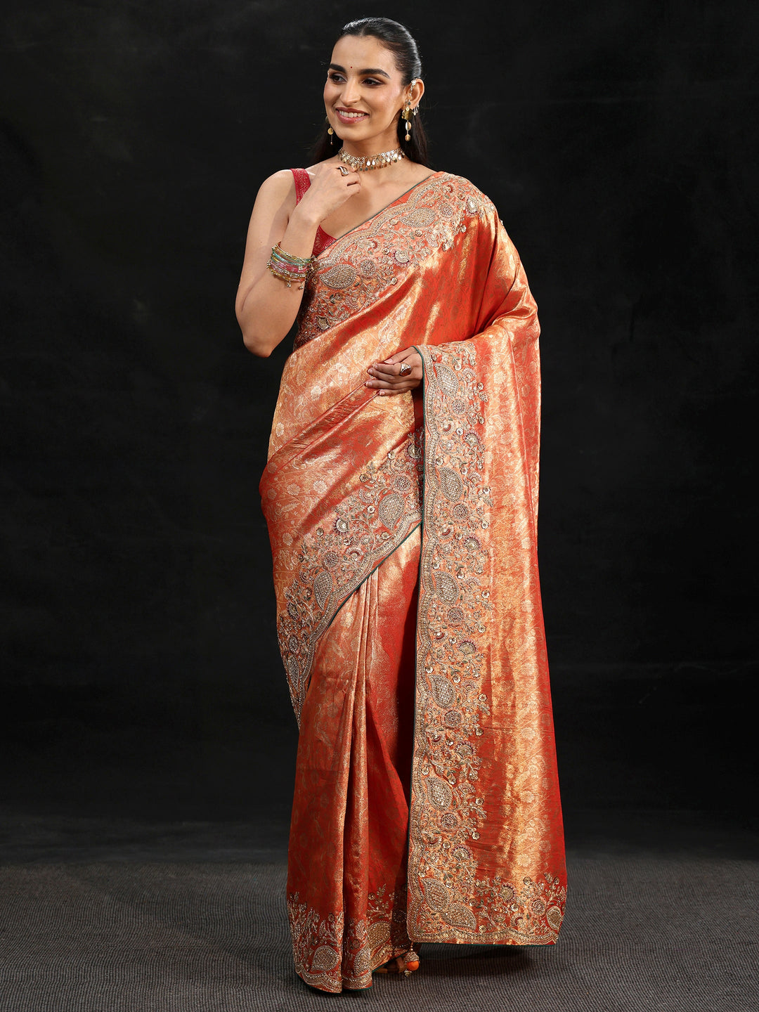 Libas Apricot Orange Woven Design Satin Saree with Embellished Border
